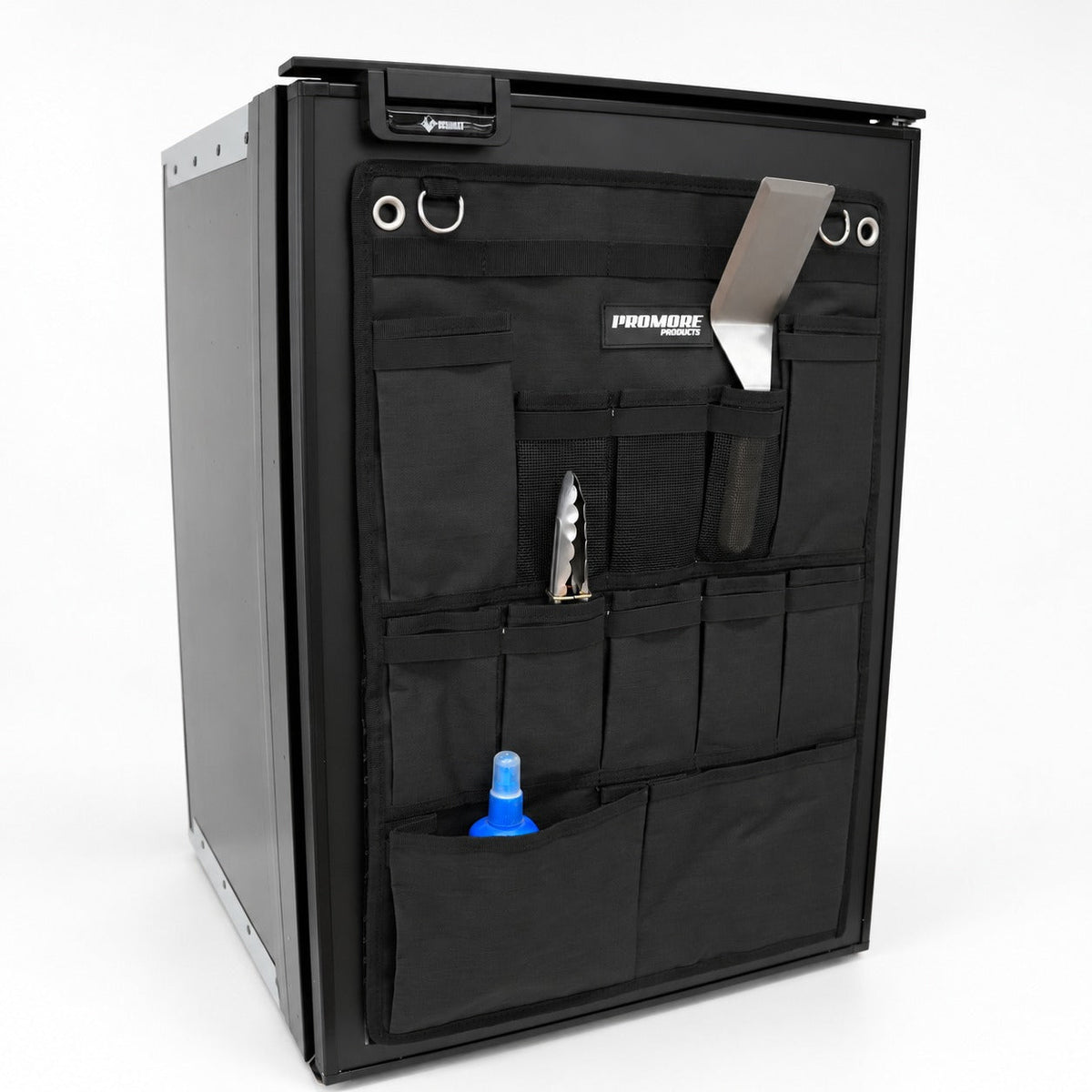 Angled view of the Promore Products Upright Fridge Organiser Large on an upright fridge door with utensils in the pockets