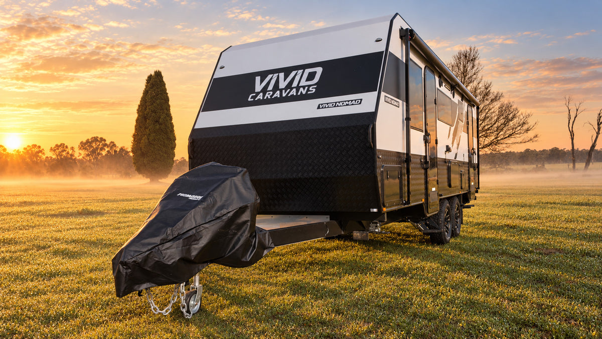The same caravan at sunrise with the black Promore Products hitch cover fitted over the hitch and gas bottles