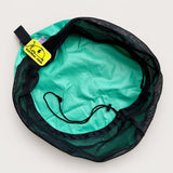 Green electrical lead bag open from above on a plain background, showing the mesh top, drawstring and rubber tag