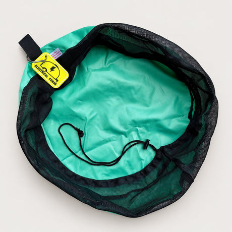 Green electrical lead bag open from above on a plain background, showing the mesh top, drawstring and rubber tag
