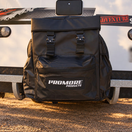 Promore Products Premium Spare Tyre Bag fitted to a caravan spare wheel at golden hour