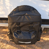 Promore Products Premium Spare Tyre Bag fitted to a spare wheel with the zip front pocket open