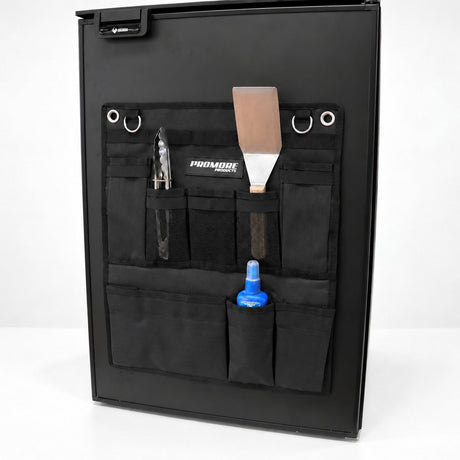 Promore Products Upright Fridge Organiser Small on an upright fridge door holding cooking utensils and a bottle