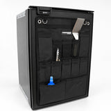 Angled view of the Promore Products Upright Fridge Organiser Large on an upright fridge door with utensils in the pockets