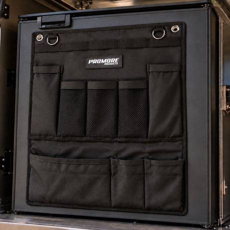 Promore Products Upright Fridge Organiser stuck to the door of a black upright fridge in a ute canopy